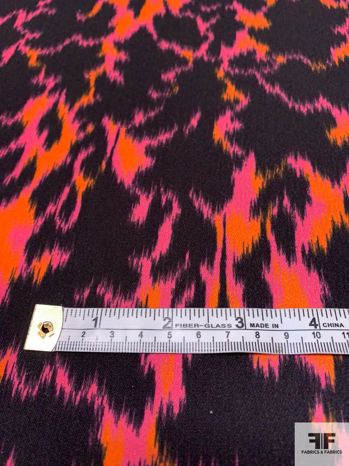 Abstract Ikat Printed Fine Polyester Crepe - Orange / Magenta / Black