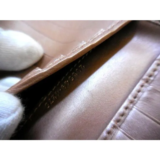 Gucci Camel Leather With An Embossed Large G Print And A Gold Heart Shaped Accent Design Wallet