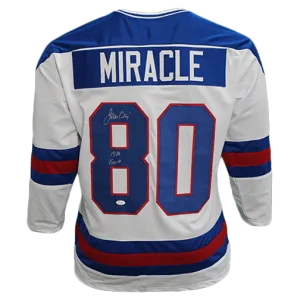 Jim Craig Autographed USA "MIRACLE" Hockey Jersey (JSA) w/ 1980 Gold Inscription