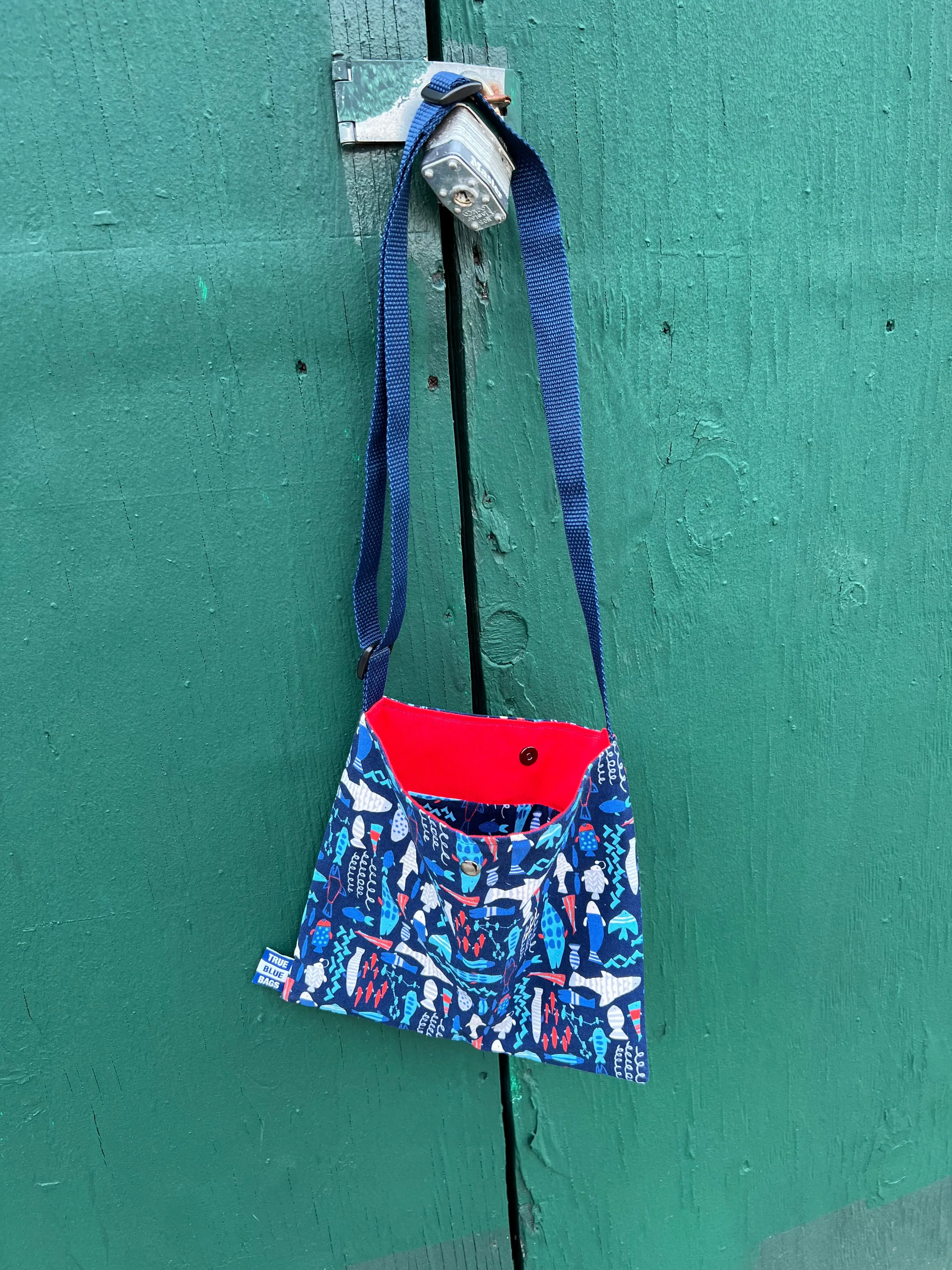 NAVY BLUE FISH FRENZY WITH RED CHERRY LINING
