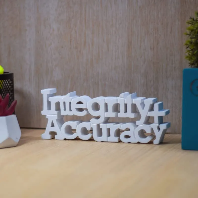NUKKAD TALES Integrity   Accuracy White Motivational Quote Showpiece Décoration Items for Office Table Book Shelf Décor Birthday Gift Items Corporate Gifts for Employees (9 x 3.40 inch)