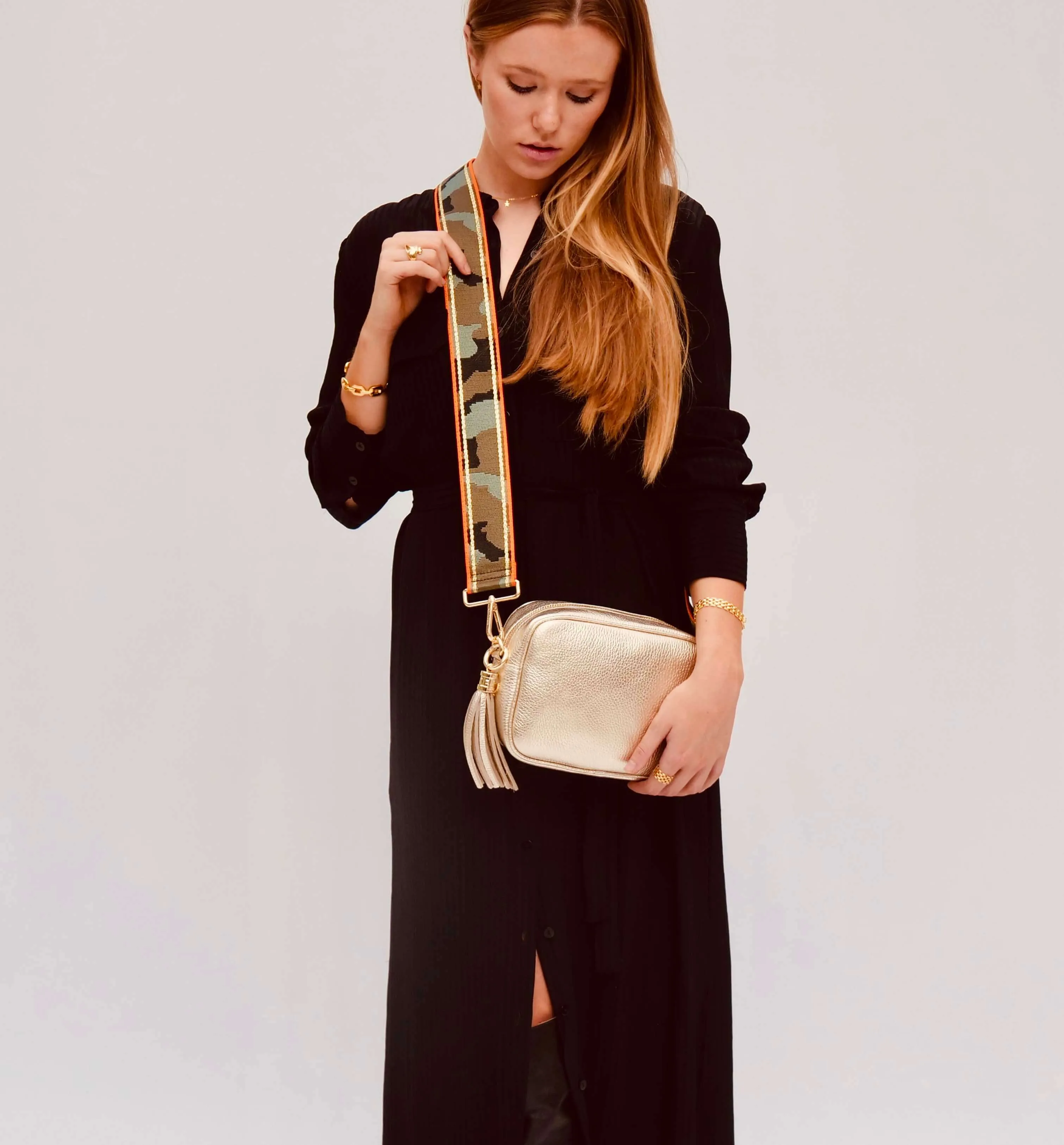 The Tassel Gold Leather Crossbody Bag With Orange & Gold Stripe Camo Strap