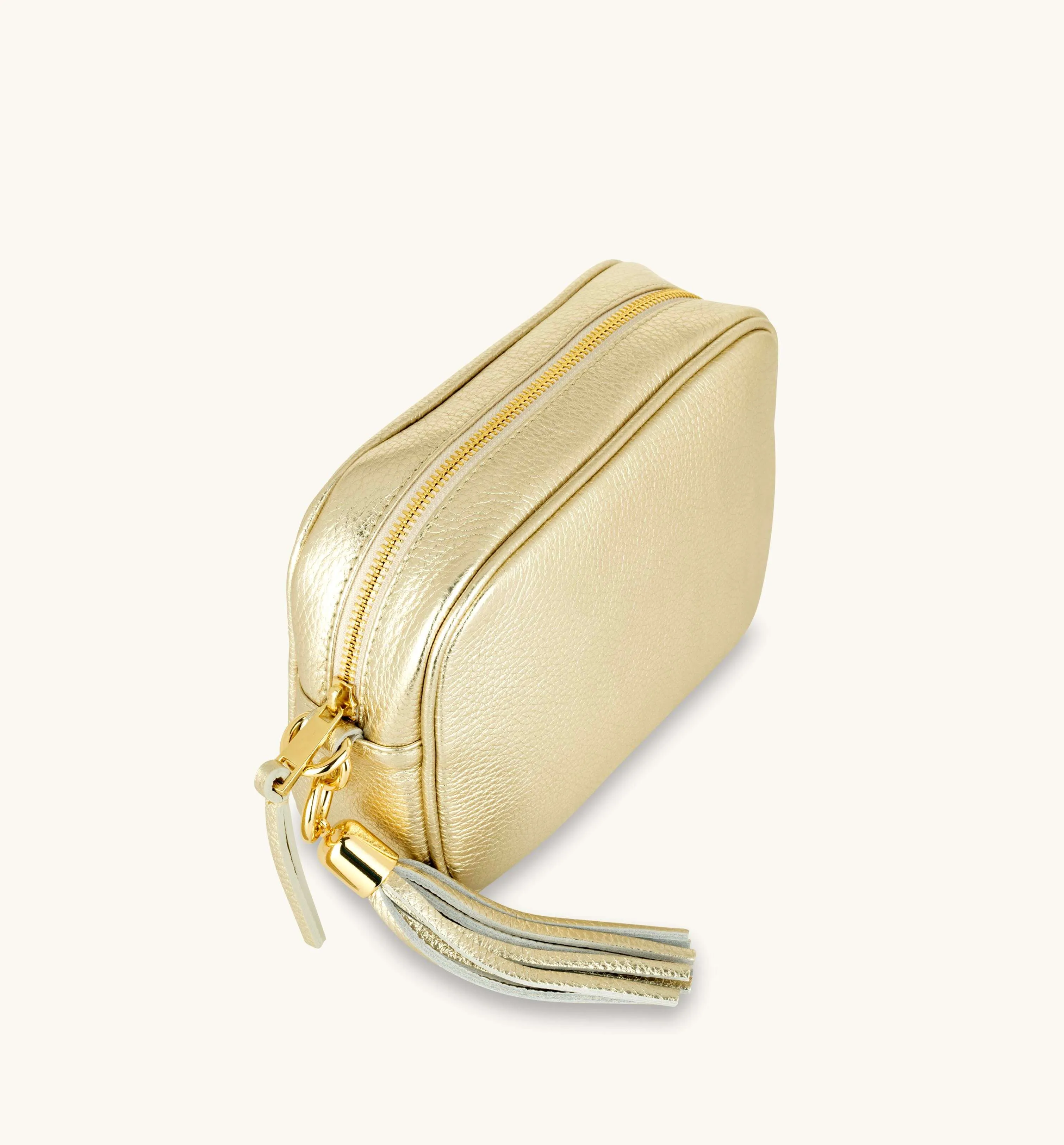The Tassel Gold Leather Crossbody Bag With Orange & Gold Stripe Camo Strap