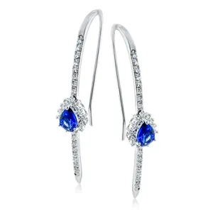 These distinctively modern linear earrings feature a splash of blue with pear shaped sapphires in their midst.