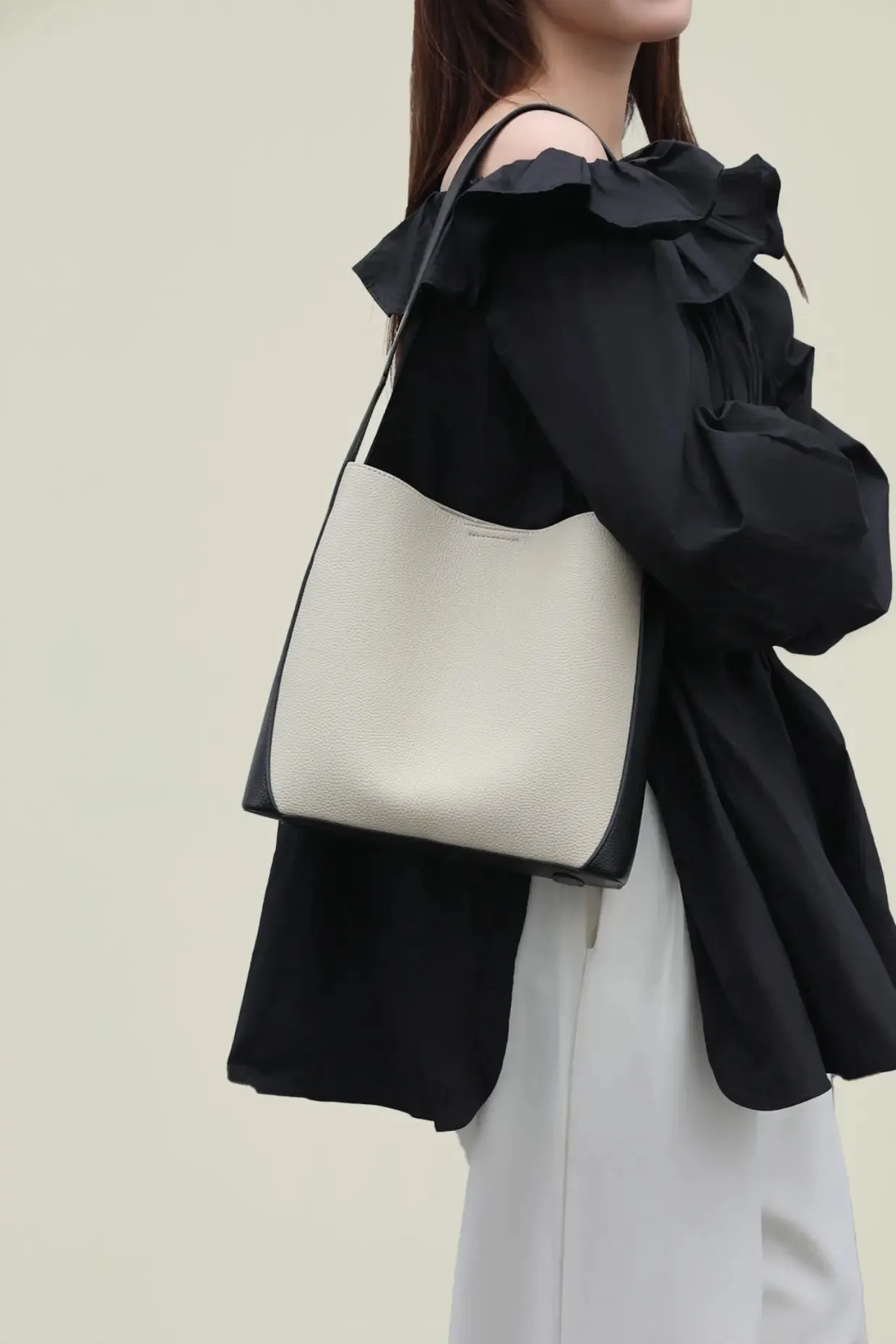 Timeless Calfskin Boho Bucket Bag with Wide Strap