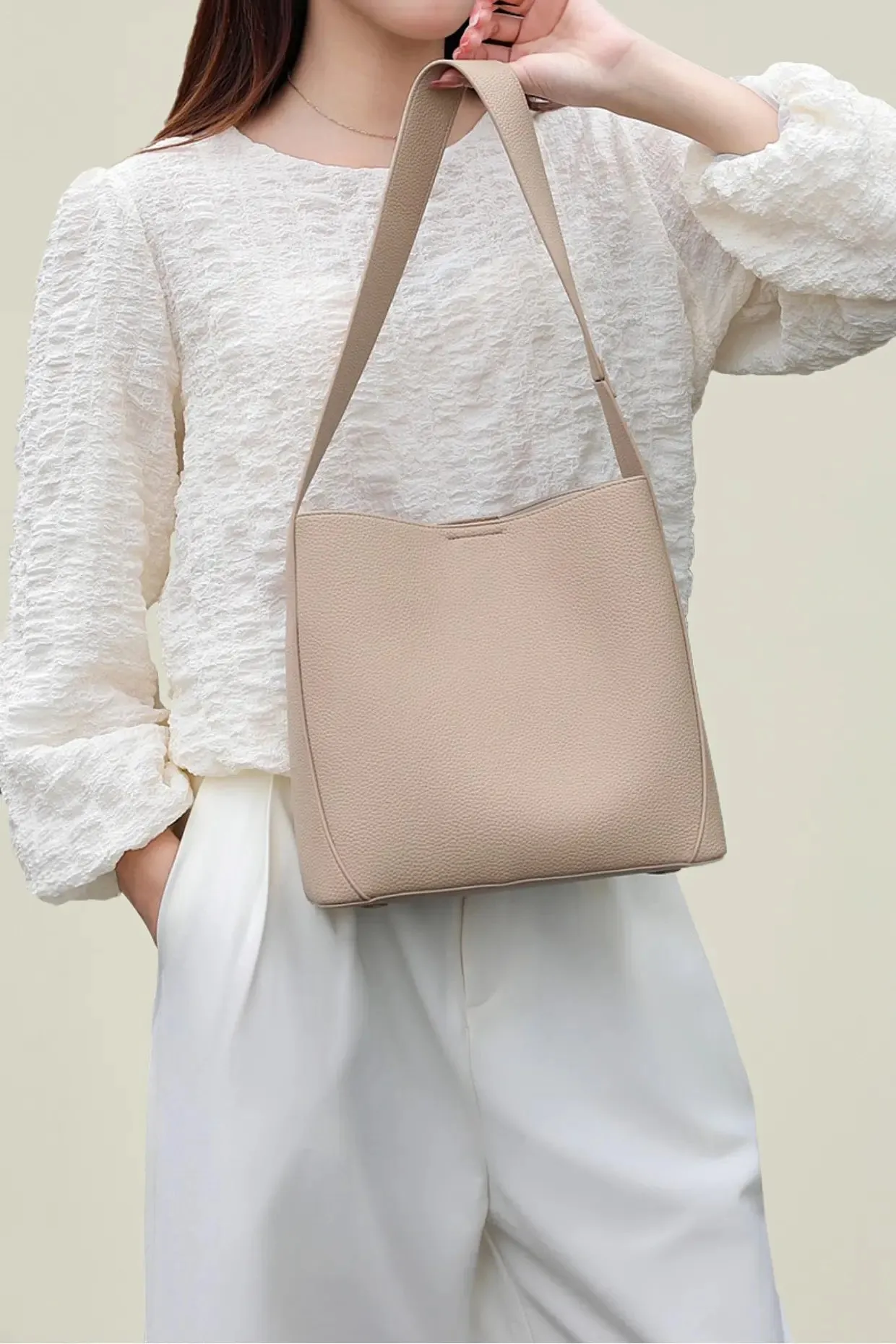 Timeless Calfskin Boho Bucket Bag with Wide Strap