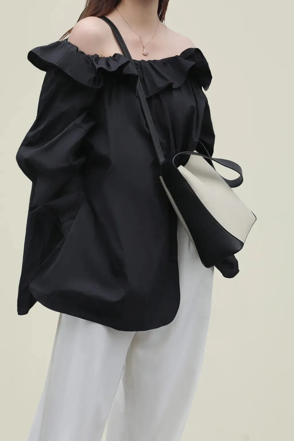 Timeless Calfskin Boho Bucket Bag with Wide Strap
