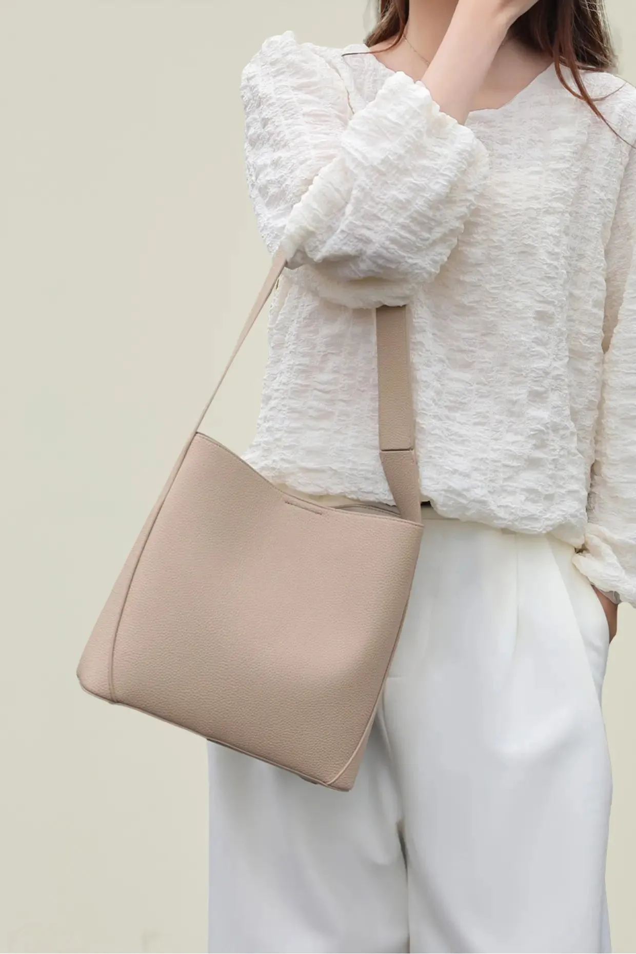 Timeless Calfskin Boho Bucket Bag with Wide Strap