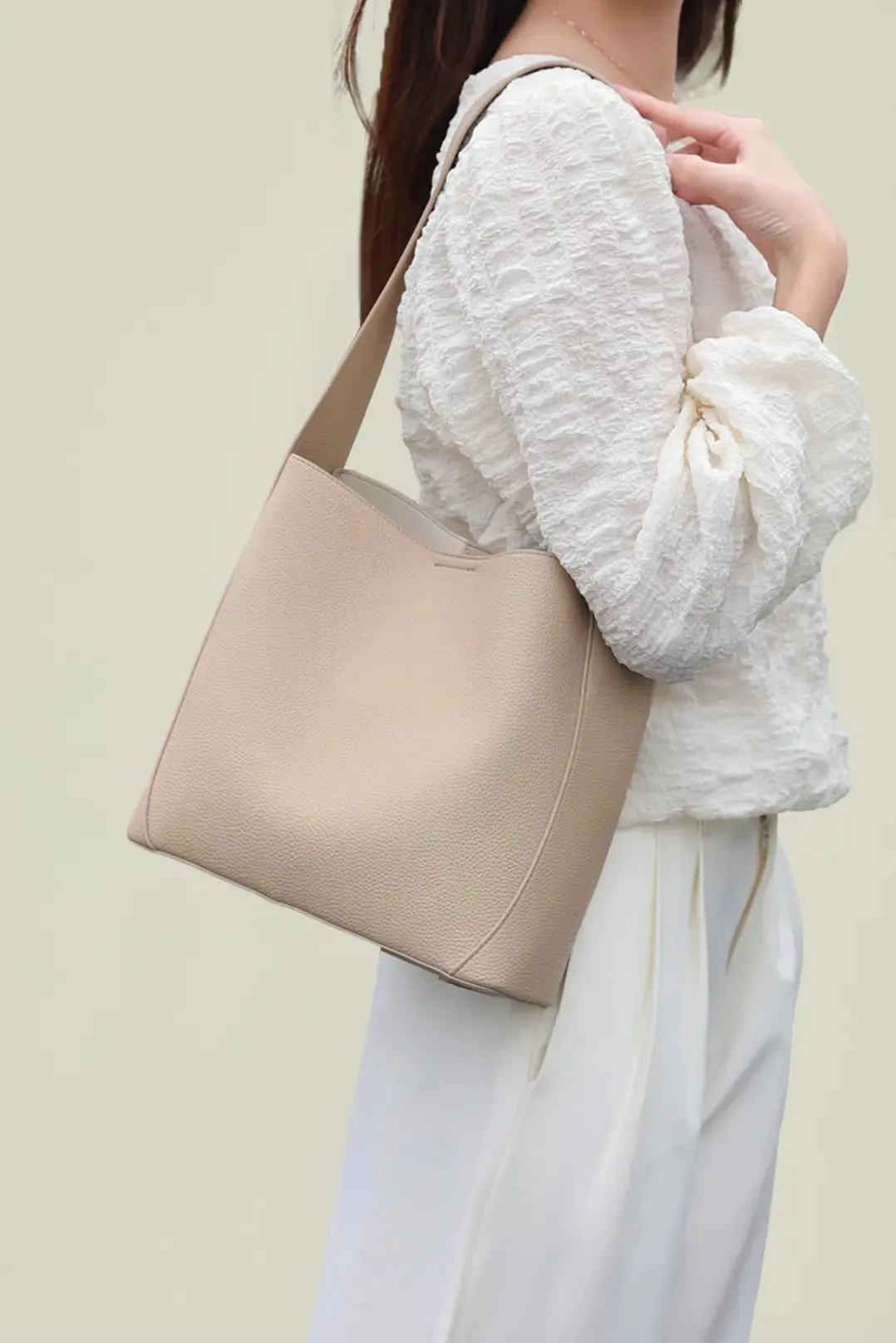 Timeless Calfskin Boho Bucket Bag with Wide Strap
