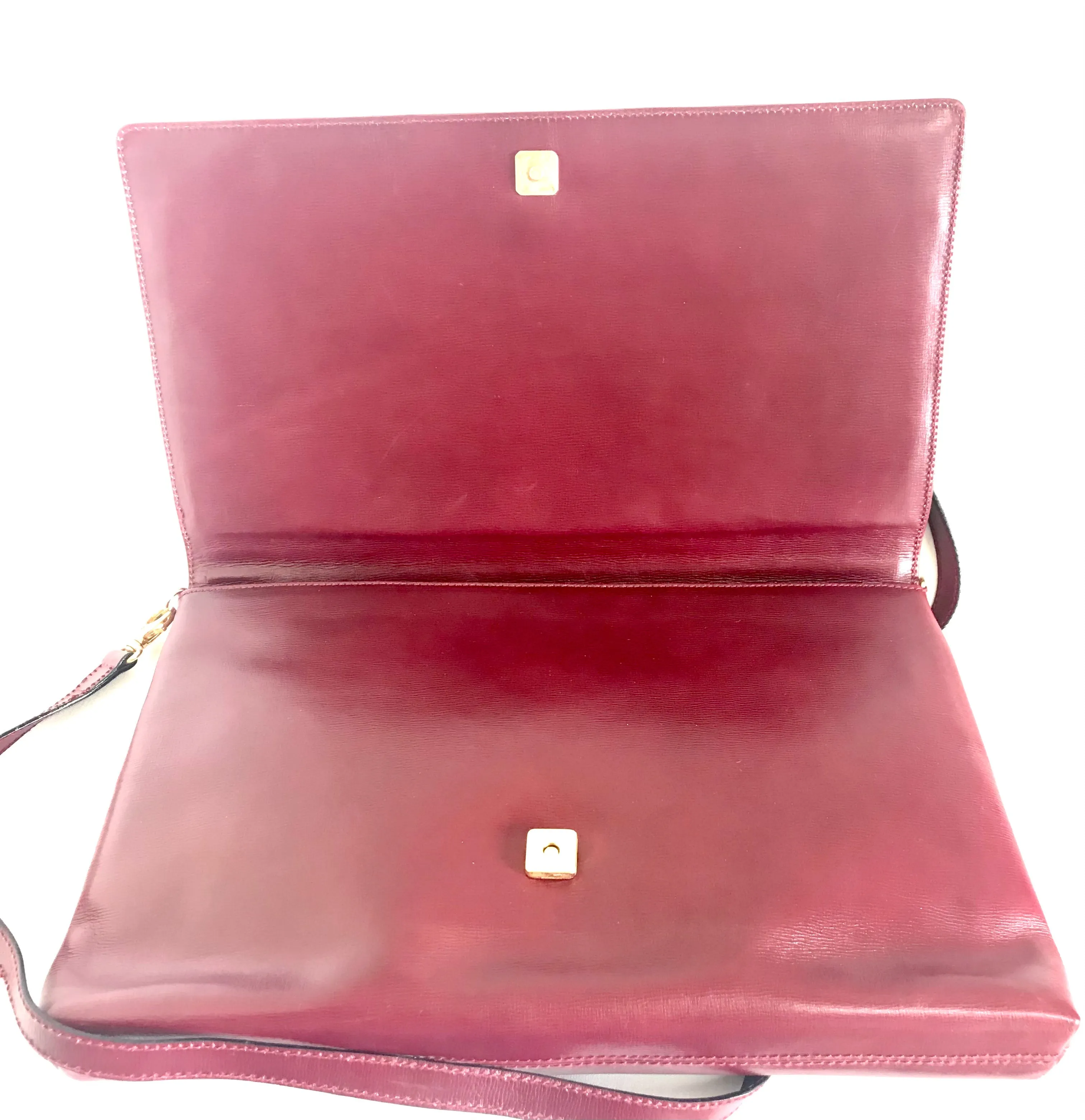 Vintage FENDI wine leather shoulder bag, large clutch purse with iconic Janus medallion embossed motifs at front. Unisex. 060620re5